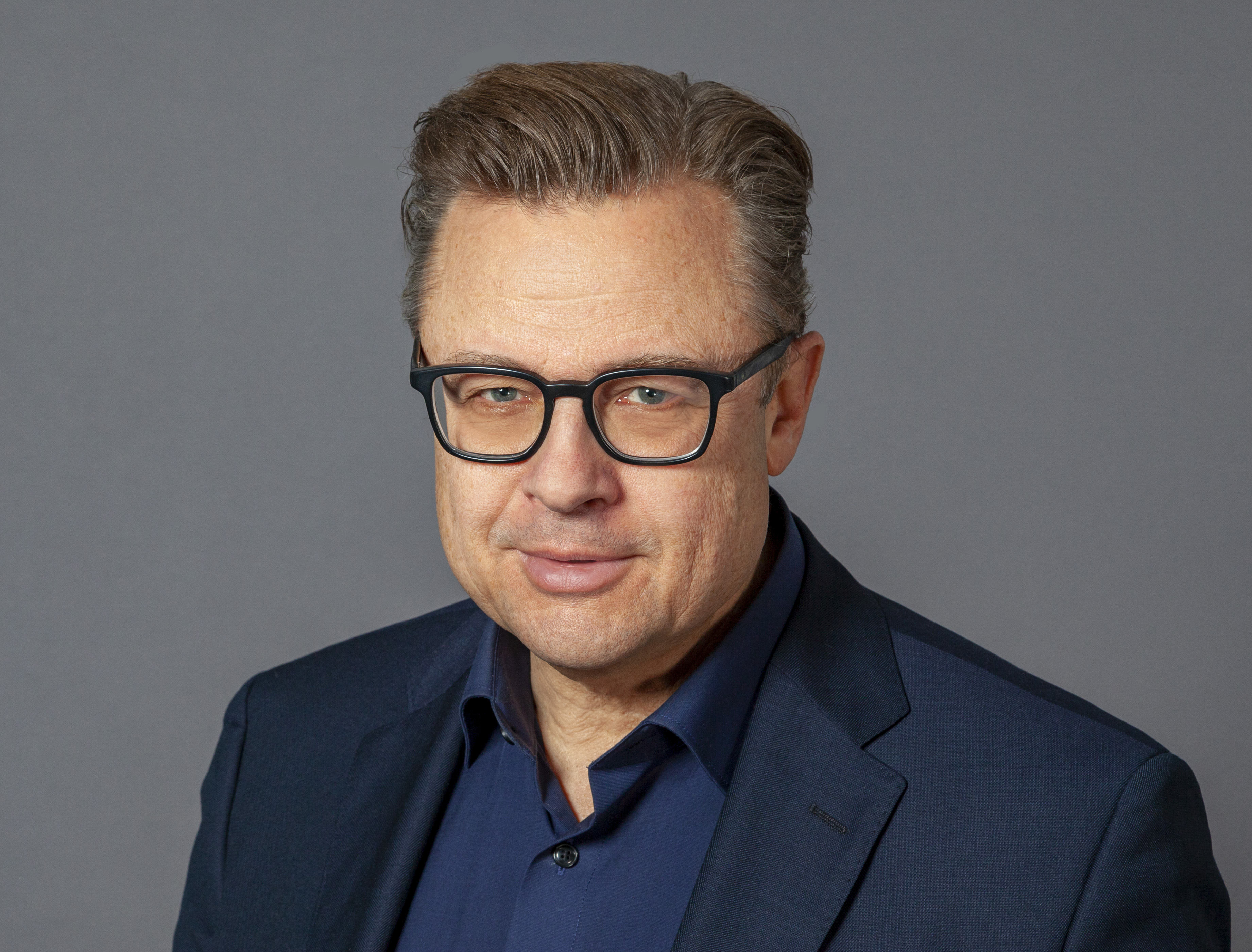 Prof. Alexander Güttler, promovierter Journalist & Marketing-Spezialist, Gründer & CEO von KOMM.PASSION