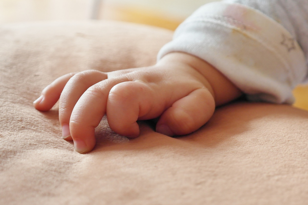 Hand eines Säuglings